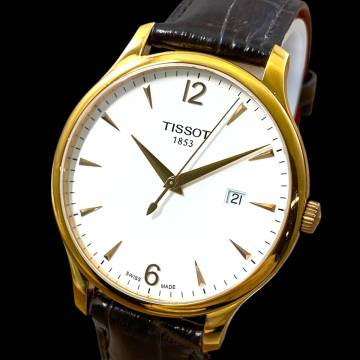 2604T010 TISSOT ティソ T063610A メンズ腕時計 動作品 クォーツ 3針 デイト ラウンド ゴールドカラー 白文字盤 革ベルト