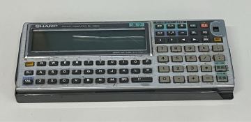 SHARP シャープ ポケットコンピュータ　PC-1360K 液晶ヒビ割れあり　動作不可　中古現状品　ジャンク(60s)
